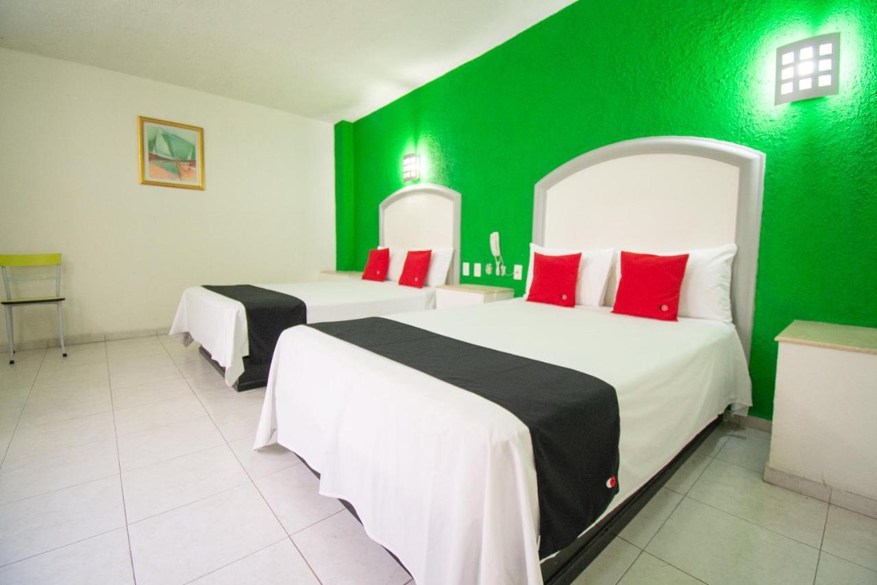 Auto Hotel Hacienda Arriba León Buitenkant foto